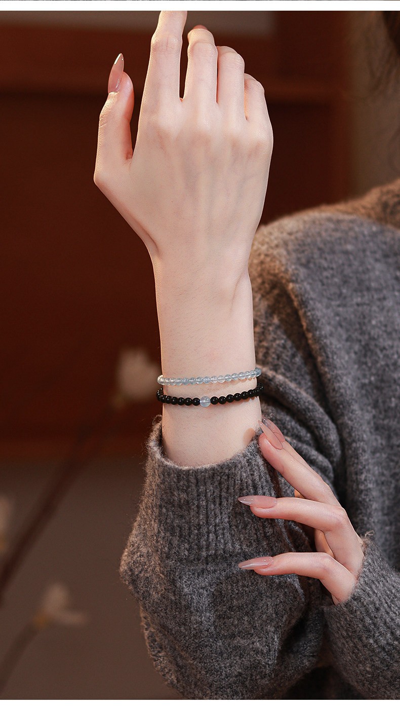 Dual-Crystal Synergy: Features a stunning combination of deep Natural Obsidian and serene Aquamarine for a sophisticated, high-contrast look. Wealth & Luck Attraction: Traditionally designed to serve as a powerful amulet for attracting prosperity and improving career fortune. Emotional Stability: The calming properties of Aquamarine help soothe the mind, reduce stress, and promote lasting emotional harmony. Ultra-Slim Minimalist Design: Boasts a delicate, small-bead aesthetic that is perfect for layering or wearing as a subtle, elegant statement piece. Authentic Natural Quality: Crafted from genuine, high-clarity gemstones, ensuring each bead has its own unique natural luster and energy. Perfect Gift Choice: An exquisite and meaningful gift for women, blending timeless beauty with spiritual wellness and positive intentions.